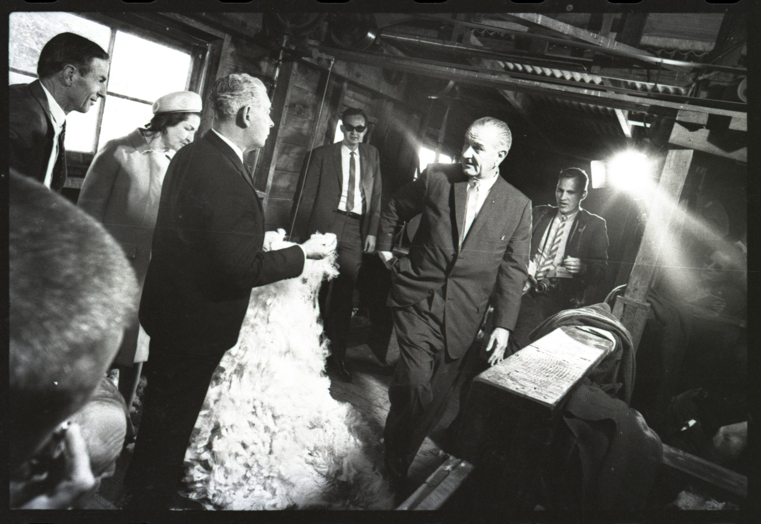 Figure 4 – Prime Minister Keith Holyoake showing President Johson one of New Zealand’s most valuable exports – wool. Reference: Negative, President Lyndon Johnson and Prime Minister Keith Holyoake in a Shearing Shed. PB_0030_01_02_0001, Te Manawa. Courtesy of the Bush Family. All Rights Reserved.