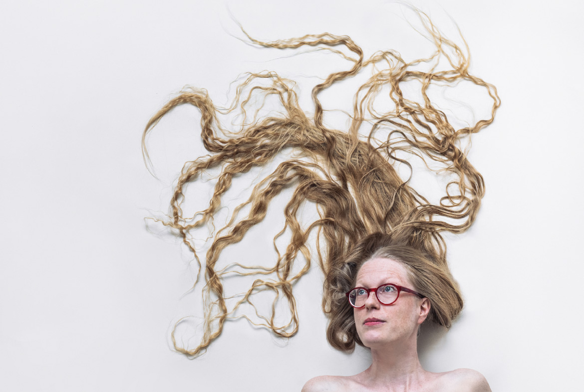 abstract portrait photo of nordic folk singing artist on a plain white background